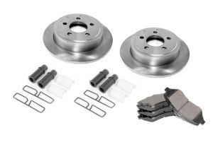 Omix-ADA Brake Kit Front (5-Bolt) For 1982-1986 Jeep CJ Series (Includes Rotors, Pads and Caliper Hardware Kit) 16760.05
